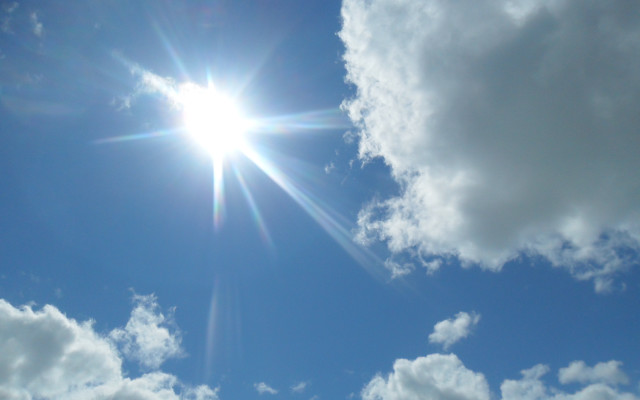 Bright sun clouds blue sky free wallpaper for desktop - medium preview image