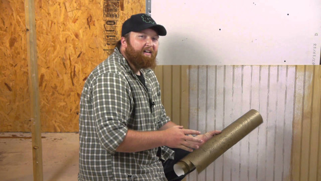 Man holding rolled metal room free wallpaper for desktop - medium preview image