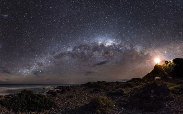 Night sky stars lighthouse rocky free wallpaper for desktop - medium preview image