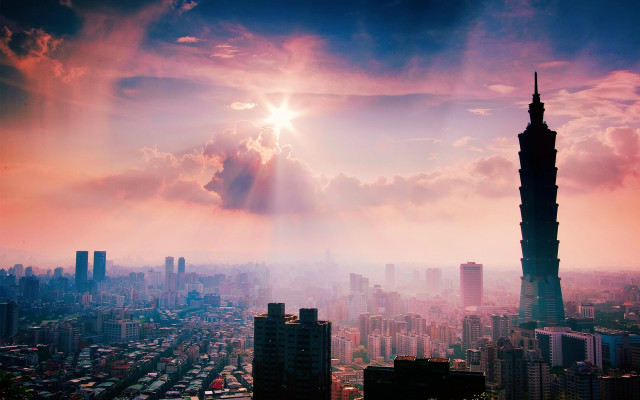 City skyline tower sunlight clouds free wallpaper for desktop - medium preview image
