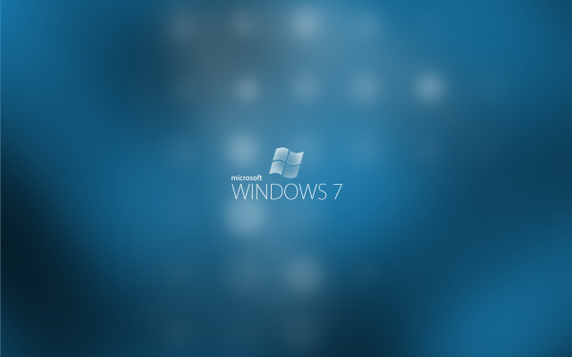 Blue windows7 logo blurry stars free wallpaper for desktop - medium preview image