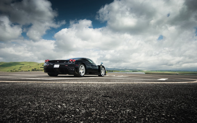 Black sports car cloudy sky #5 free wallpaper for desktop - medium preview image
