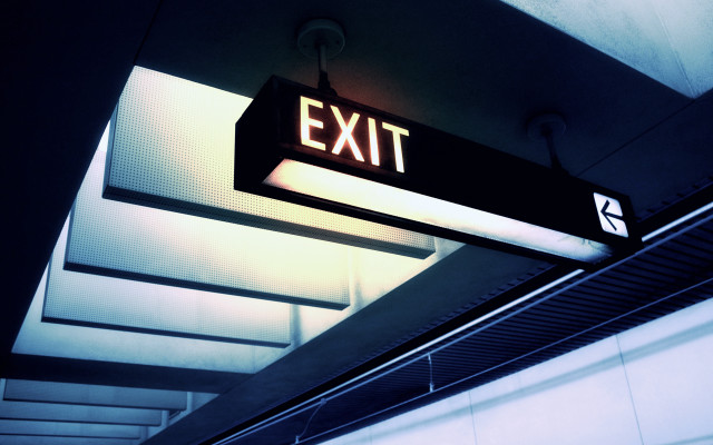 Exit sign hanging hallway institutional free wallpaper for desktop - medium preview image