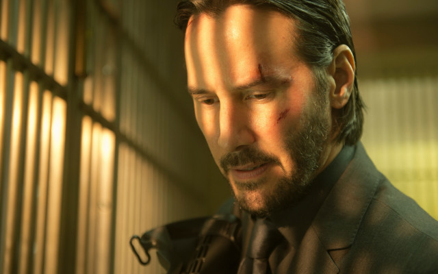 Man suit tie cellphone dimly free wallpaper for desktop - medium preview image