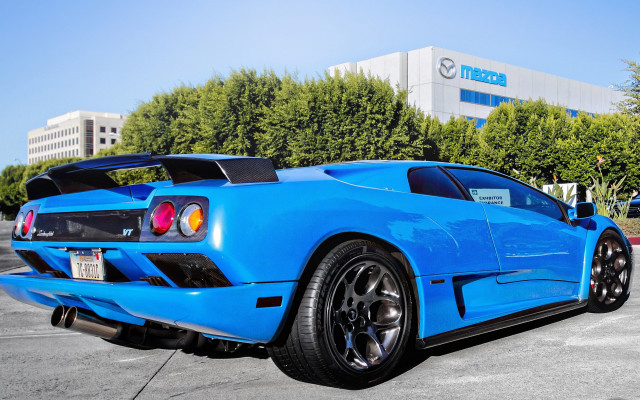 Blue sports car parking lot #9 free wallpaper for desktop - medium preview image
