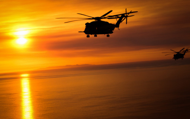 Helicopter ocean sunset backlit dusk free wallpaper for desktop - medium preview image