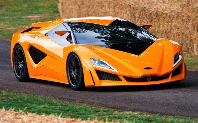 Orange sports car driving road #4 free wallpaper for desktop - medium preview image