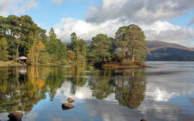 Lake trees hut cloudy sky free wallpaper for desktop - medium preview image
