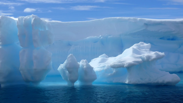 Large iceberg ocean ecological art free wallpaper for desktop - medium preview image
