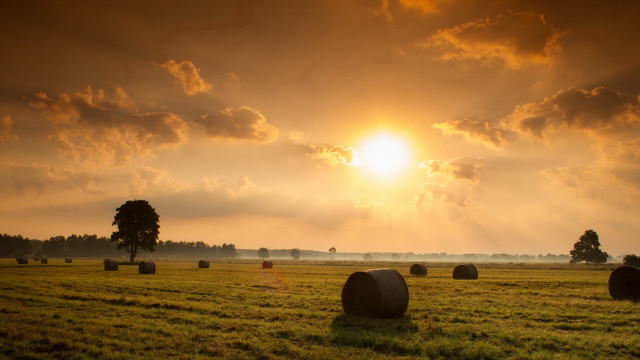 Hay bales sunset clouds mountain free wallpaper for desktop - medium preview image