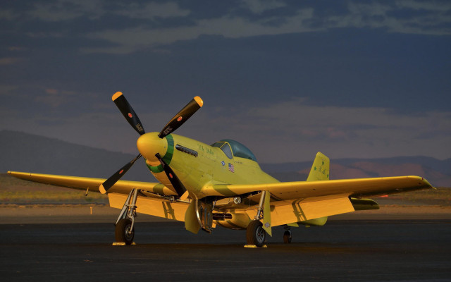 Yellow airplane runway mountains dusk free wallpaper for desktop - medium preview image