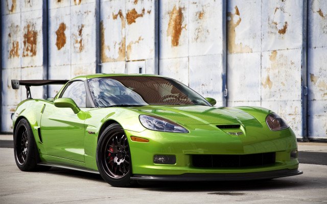 Green sports car rusty wall #2 free wallpaper for desktop - medium preview image