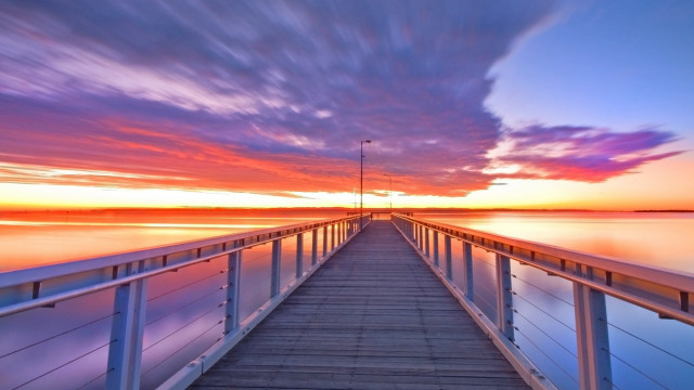 Long pier sunset clouds sky free wallpaper for desktop - medium preview image
