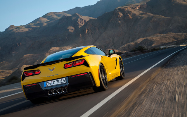 Yellow sports car mountains blue free wallpaper for desktop - medium preview image