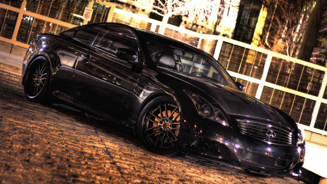 Black car night cityscape fence free wallpaper for desktop - medium preview image