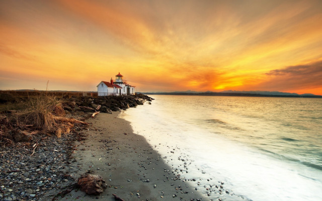 Lighthouse rocky shore sunset ocean #4 free wallpaper for desktop - medium preview image