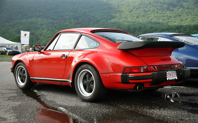 Red porsche parking lot mountains free wallpaper for desktop - medium preview image