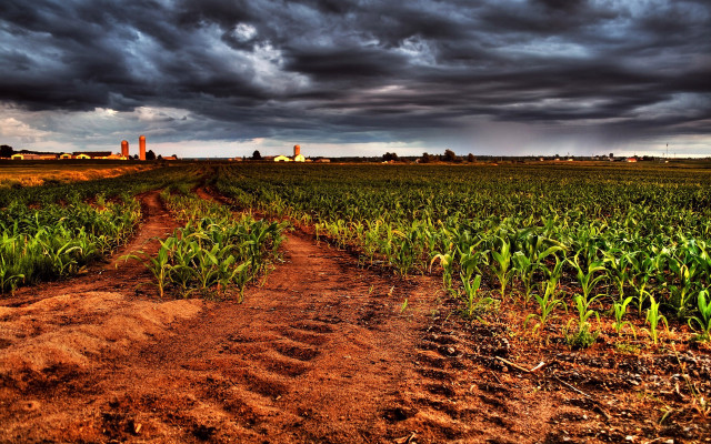 Stormy dirt road cityscape clouds free wallpaper for desktop - medium preview image