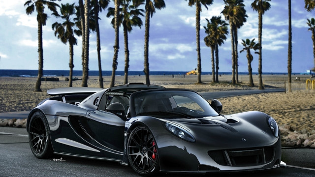 Black sports car beach road free wallpaper for desktop - medium preview image