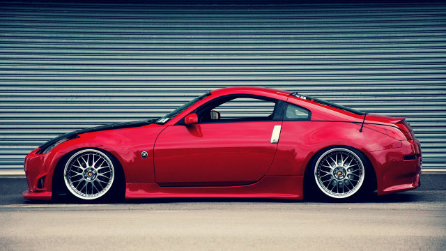 Red sports car garage roller #2 free wallpaper for desktop - medium preview image