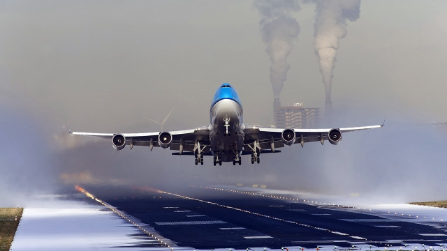 Jetliner cloudy sky smoke runway free wallpaper for desktop - medium preview image
