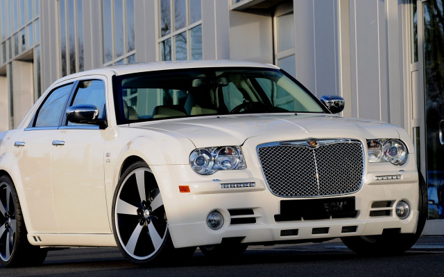 White car road building streetsign free wallpaper for desktop - medium preview image