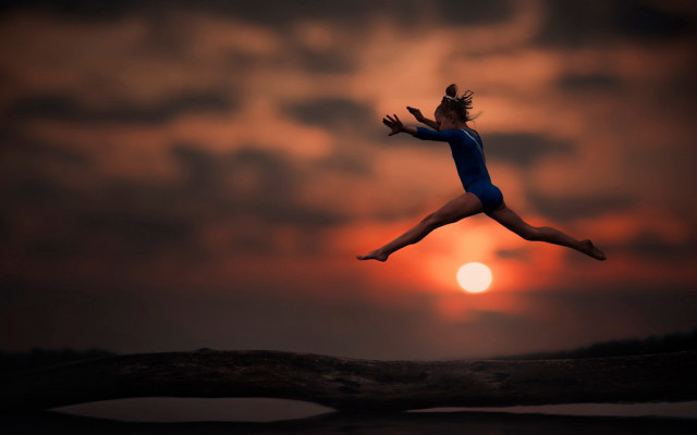 Woman jumping sunset tree microscopic free wallpaper for desktop - medium preview image