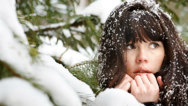 Woman snowy background looking up free wallpaper for desktop - medium preview image