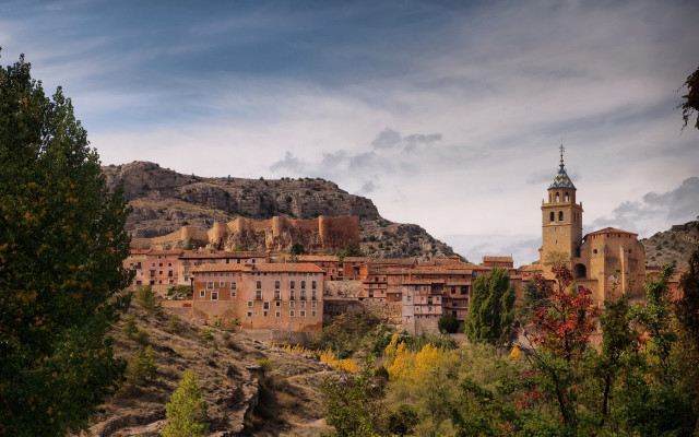 Village clocktower hillside mountains trees free wallpaper for desktop - medium preview image