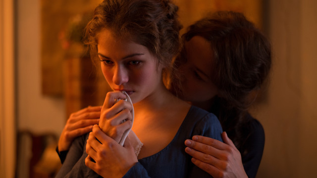 Woman controller remote blurry flemish free wallpaper for desktop - medium preview image