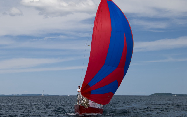 Red blue sailboat ocean cloudy free wallpaper for desktop - medium preview image