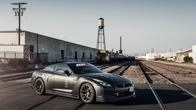 Silver car traintrack water tower free wallpaper for desktop - medium preview image