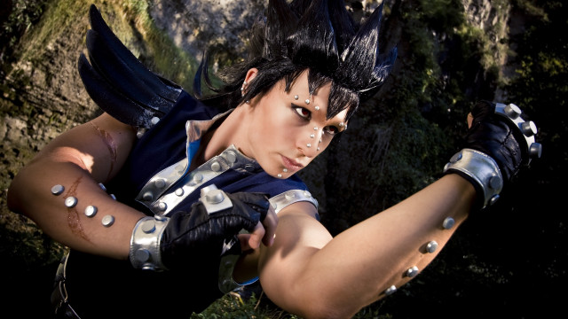 Woman cosplay sword rock tree free wallpaper for desktop - medium preview image