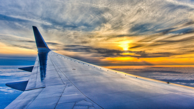 Plane wing sunset ocean clouds free wallpaper for desktop - medium preview image