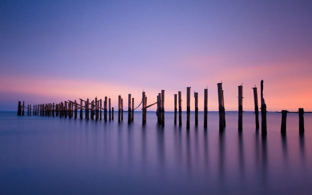 Poles water sunset purple sky free wallpaper for desktop - medium preview image