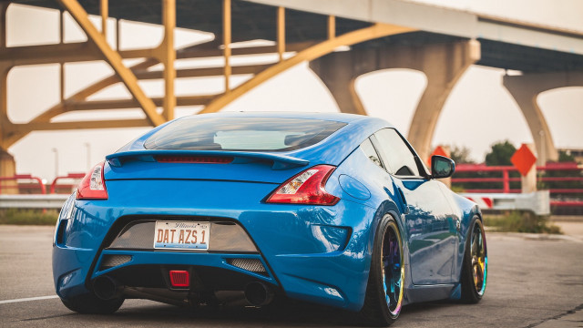 Blue sports car bridge yellow free wallpaper for desktop - medium preview image