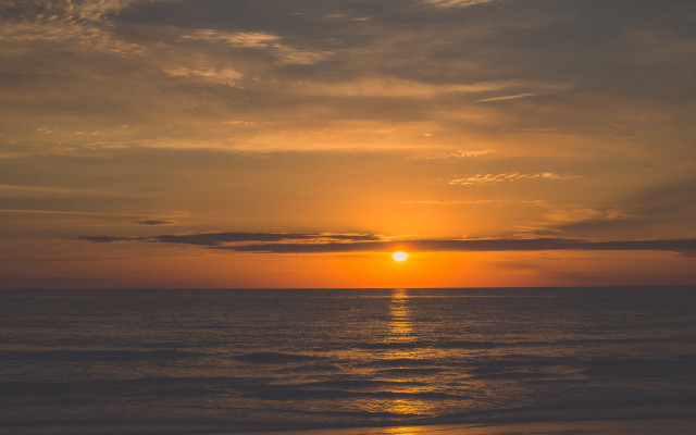 Sunset ocean boat beach lights free wallpaper for desktop - medium preview image