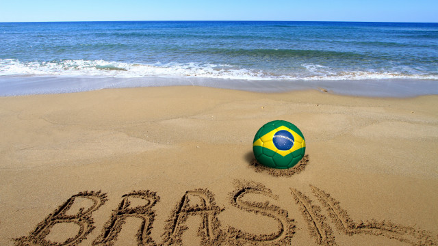Beachball brasil sand ocean tiltshift free wallpaper for desktop - medium preview image
