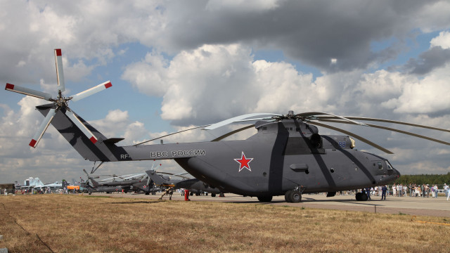 Military helicopter runway people cloudy free wallpaper for desktop - medium preview image