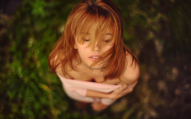 Red haired woman reading book free wallpaper for desktop - medium preview image