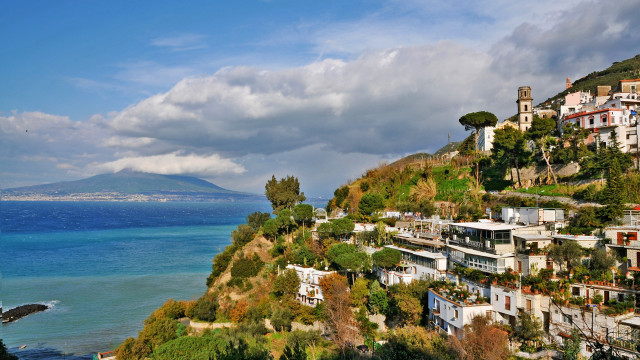 Hillside houses mountain watercity sky free wallpaper for desktop - medium preview image