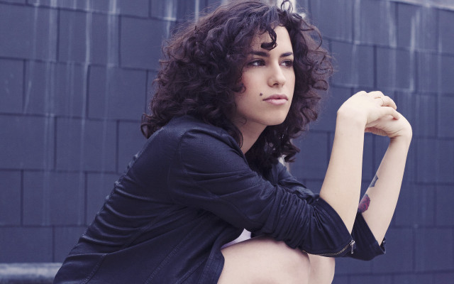 Woman curly hair rooftop fence free wallpaper for desktop - medium preview image