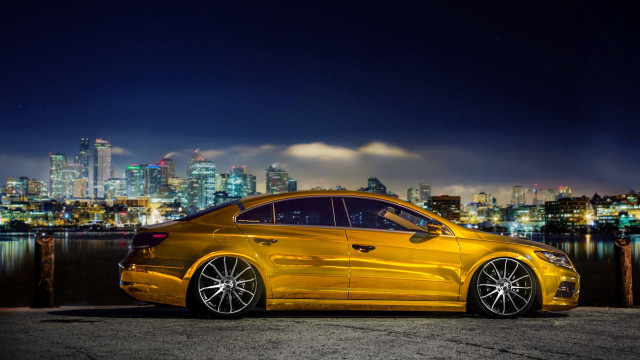 Yellow car night cityscape lights free wallpaper for desktop - medium preview image