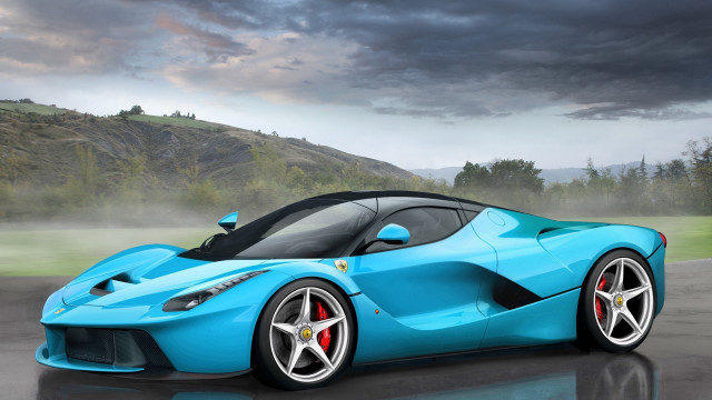 Blue sports car wet road #2 free wallpaper for desktop - medium preview image