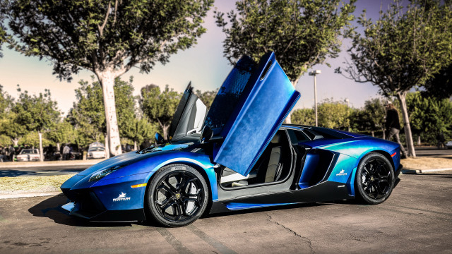 Blue sports car open parking free wallpaper for desktop - medium preview image