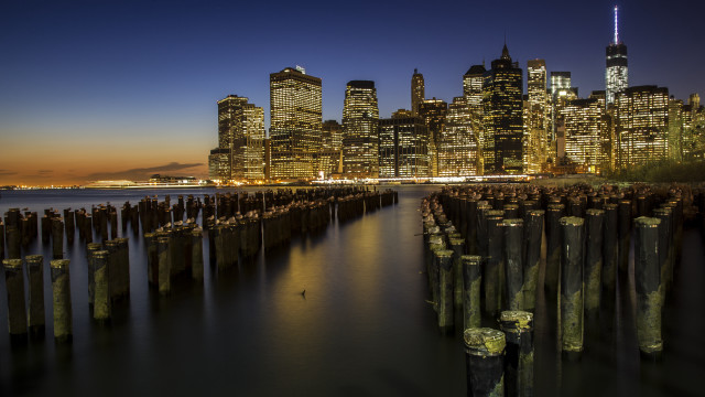 City skyline night water dock free wallpaper for desktop - medium preview image