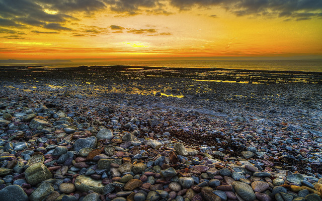 Bascove beach rocks water cloudy #3 free wallpaper for desktop - medium preview image