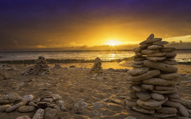 Beach sunset rocks sandcastle landart free wallpaper for desktop - medium preview image