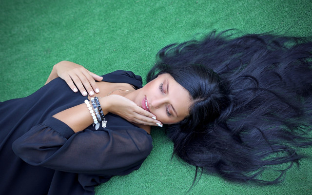 Woman lying back hair air free wallpaper for desktop - medium preview image