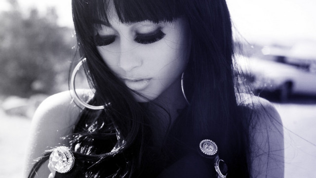 Woman black hair earrings phone free wallpaper for desktop - medium preview image